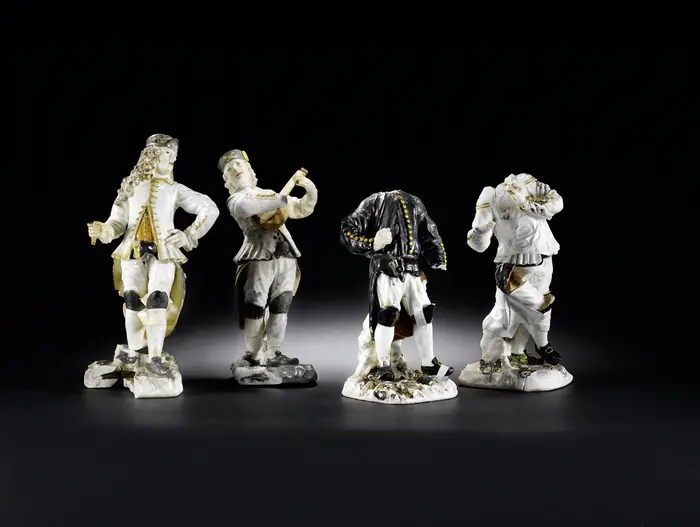 Figures from a group of miners