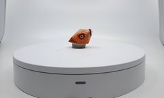 Foto, Porzellandeckel in Fischform auf einem drehbaren Untersatz